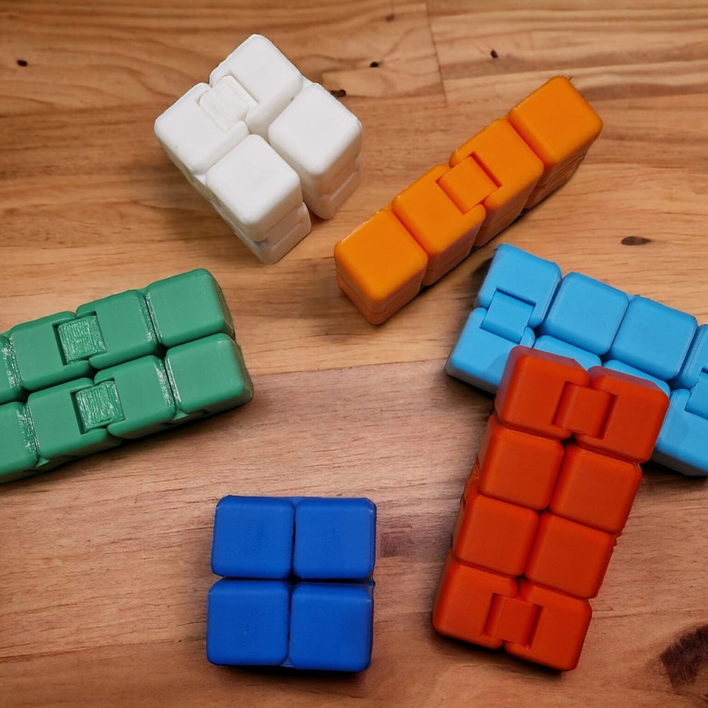 Explore endless relaxation with our collection of infinity fidget cubes - perfect for stress relief and focus. These compact sensory tools offer a variety of movements, providing a calming experience.