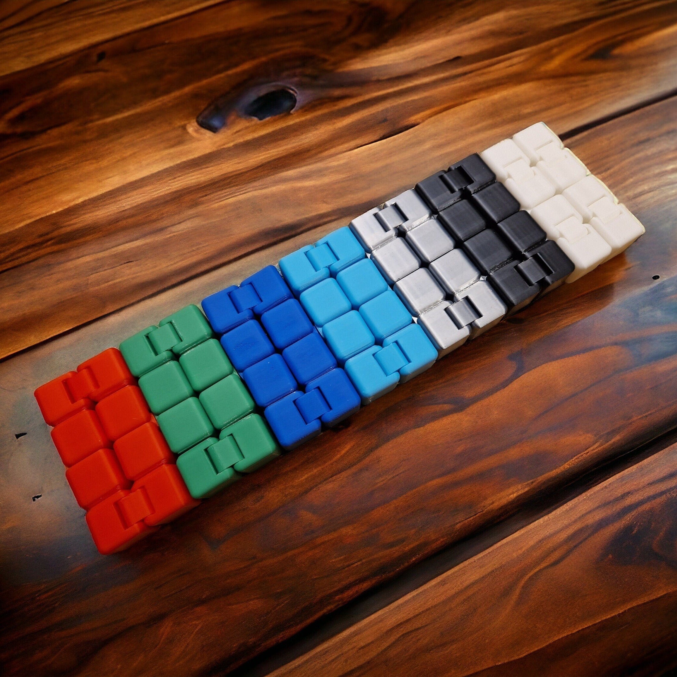 Explore endless relaxation with our collection of infinity fidget cubes - perfect for stress relief and focus. These compact sensory tools offer a variety of movements, providing a calming experience.