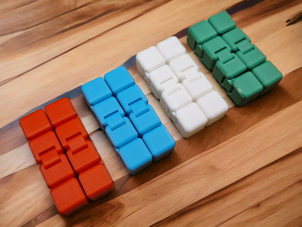 Explore endless relaxation with our collection of infinity fidget cubes - perfect for stress relief and focus. These compact sensory tools offer a variety of movements, providing a calming experience.